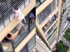 Vizinhos salvam menina de 3 anos pendurada no 12º andar de prédio; vídeo